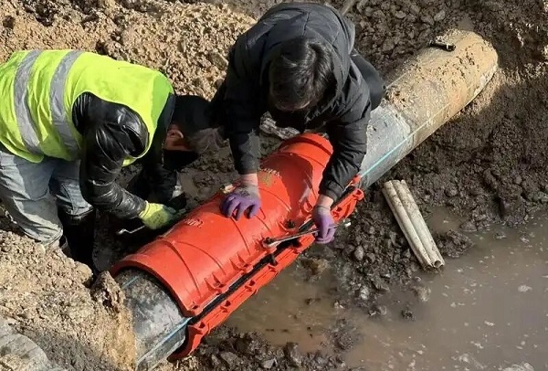 D.I. repair clamp for HDPE water pipe leak repair.